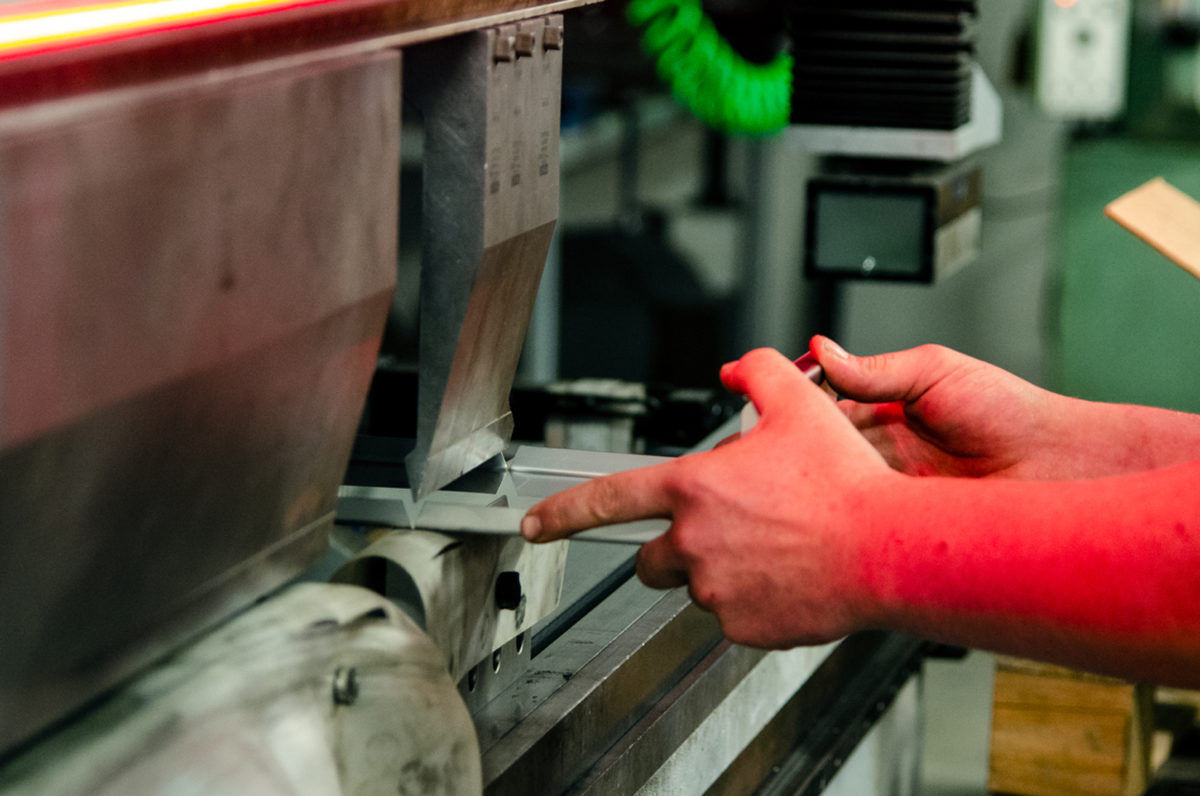fabricator performing CNC metal forming