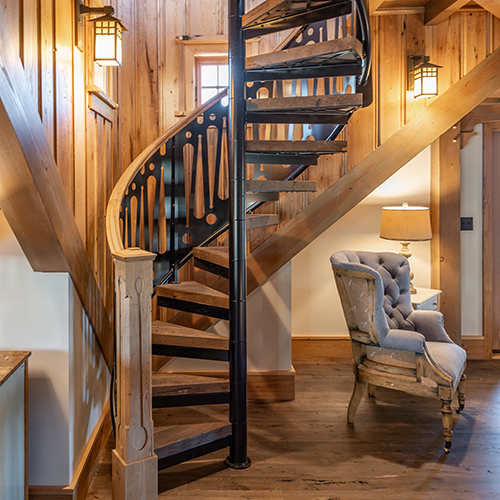 spiral wood and metal staircase in home