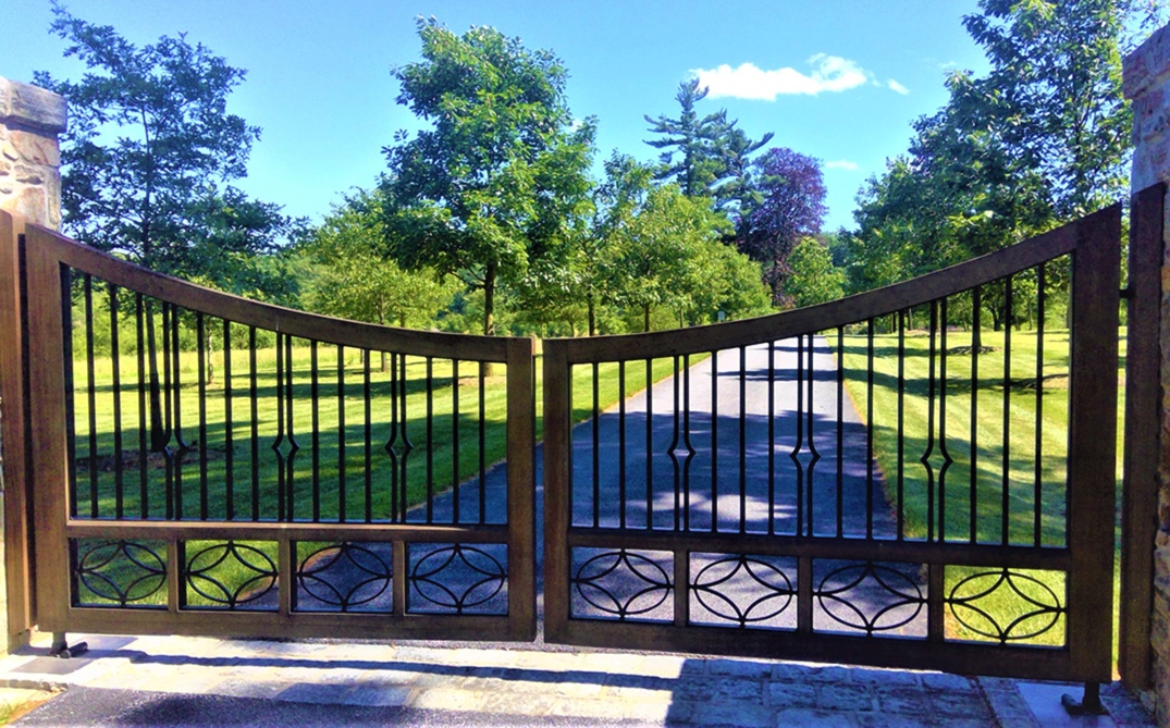 Three Reasons You Should Add a Metal Driveway Gate to Your Property